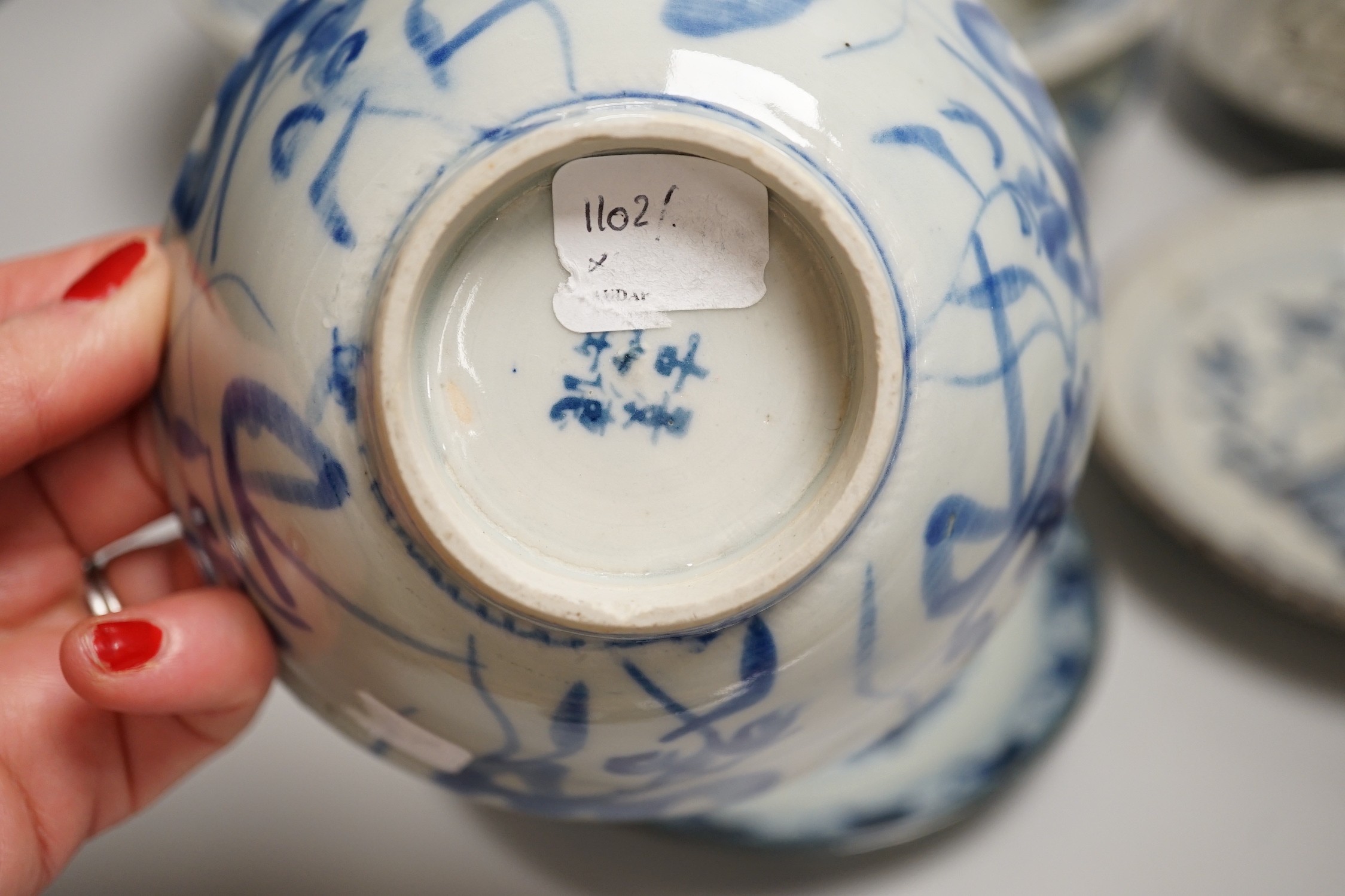 A Chinese blue and white bowl, tea bowl and saucer, and two other dishes, largest 29cm diameter